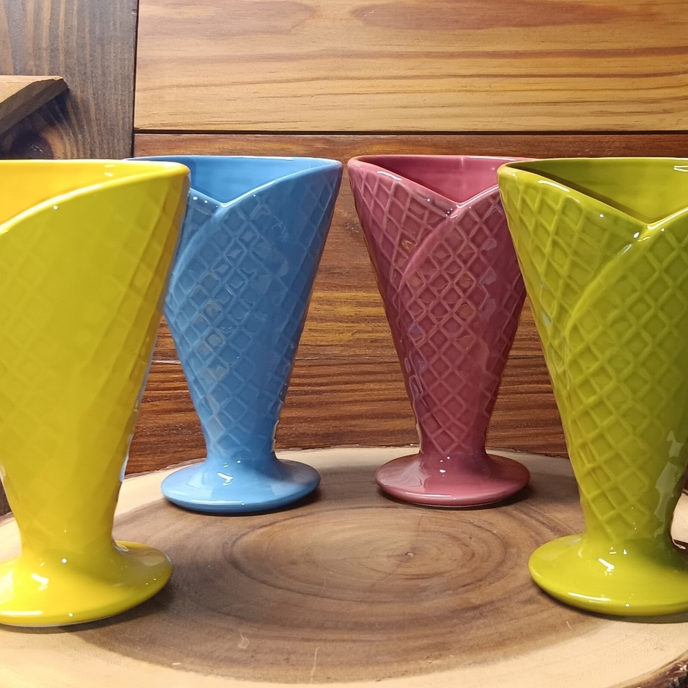 4 bright colorful ice cream sundae dishes. Ceramic